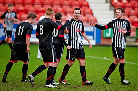 Declan OKane is congratulated for his goal