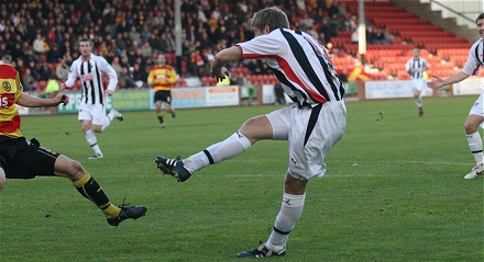 Iain Williamson fires on goal