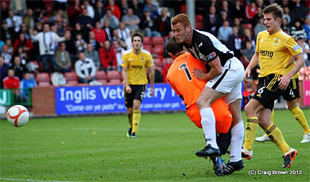 Ryan Thomson scores   (c) Craig Brown