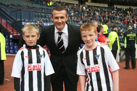 Jim McIntyre with mascots
