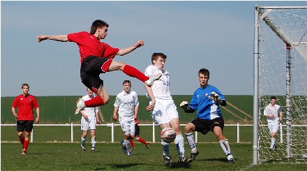 John MacDonald challenges for the ball v Montrose