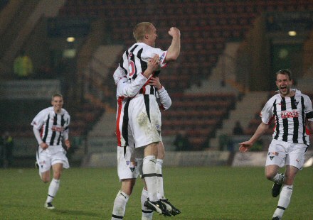 Greg Shields celebrates