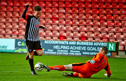 Chris Smith wins the one on one with Lawrence Shankland