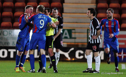 Jonny Hayes and Richie Foran clash