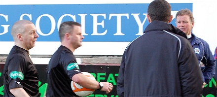 Jim MCIntyre and Gordon Chisholm greet Referee Steven Nicholls