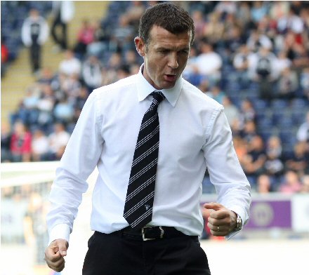 Jim McIntyre celebrates a win at Falkirk