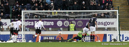 Mark Miller scores from the penalty spot