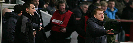 Jim McIntyre and Neil Lennon in the dugouts