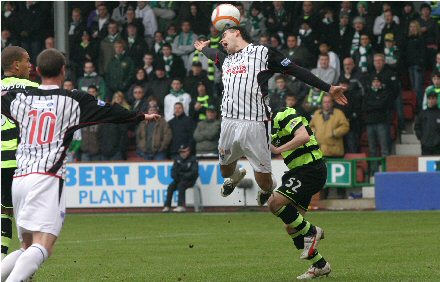 Steven Bell is pushed over by Paul Caddis