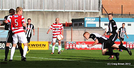 Ryan Thomson heads home