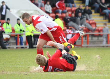 Willie Gibson is taken down by last man Tom Parratt