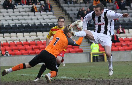 Scott Fox cuts out across in front of Andy Kirk