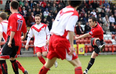 Nick Phinn shoots v Airdrie United