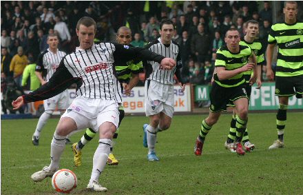 Andy Kirk scores from the spot