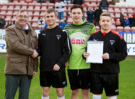 Bob Garmory with Dunfermlin?e High School&#039;s Scott Russell, Quinn Franklin and Ross Wright