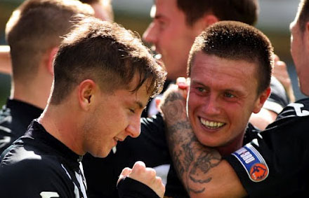 Josh Falkingham celebrates scoring the second goal