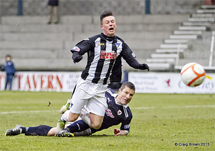 Joe Cardle taken down by Rovers player coach Grant Murray