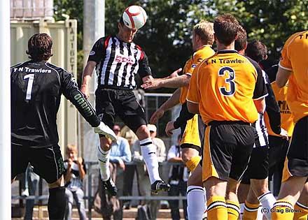 Alex Keddie connects with the ball