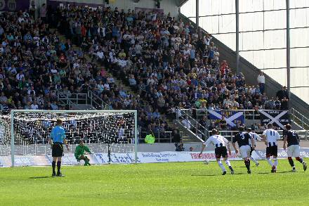 Andy Kirks penalty is saved by Bobby Olejnik