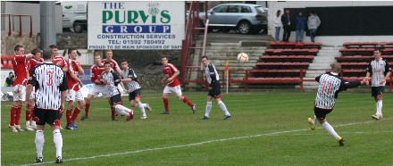 Willie Gibsons free kick goes over the top