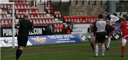 Steven Bell heads in goal for 1-2