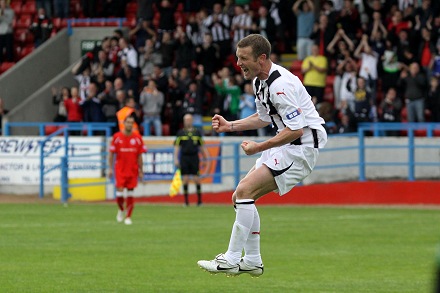 Andy Kirk celebrates his hat-trick