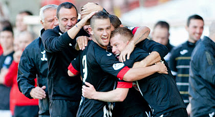 Andy Geggan celebrates