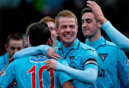 Andy Geggan congratulates Faissal El Bakhtaoui on his debut goal