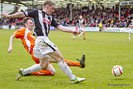 Allan Smiths shot is deflected in (c) Craig Brown