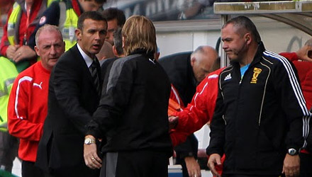 Jim McIntyre congratulates Stuart McCall