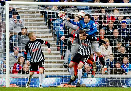 Ryan Goodfellow comes for the ball