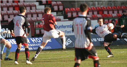 Nick Phinn shoots v Ayr United