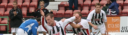 Andy Kirk scores v QOS