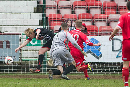 Jonathan Page clears off the line