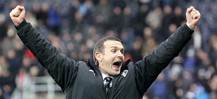 Jim McIntyre celebrates victory at Falkirk