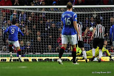 Nikica Jelavic scores from the penalty spot