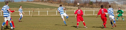 Paul Willis (hidden left) scores v Morton U19s